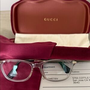 Gucci Clear Frame Glasses with Gold Accents